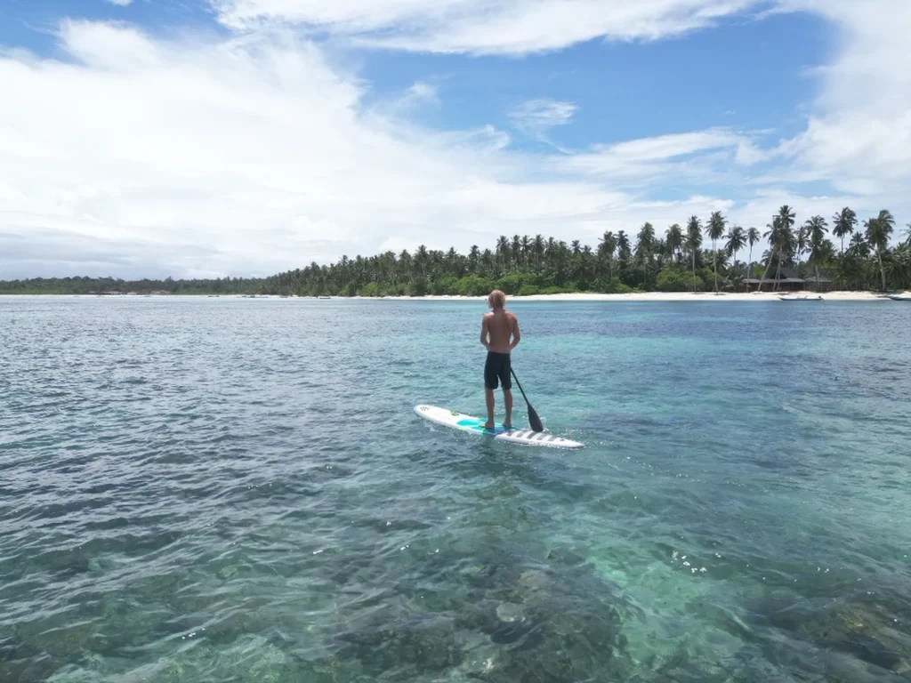 Paddleboarding in front of Nasara Resort Mentawai